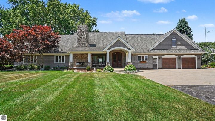 Property Photo:  115 Golfside Drive  MI 48801 