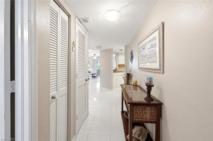 Property Photo:  4987 Pepper Cir 107  FL 34113 