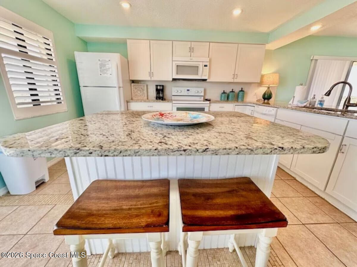 Property Photo:  1050 N Atlantic Avenue  FL 32931 
