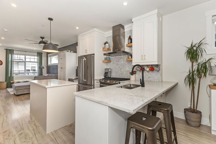 Property Photo: 22334 48 Avenue 19 BC V3A 3N5