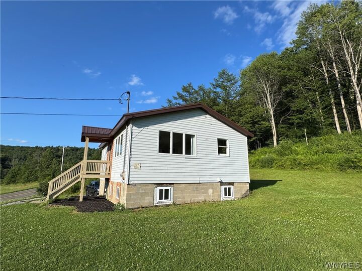 Property Photo:  8393 County Road 1  NY 14739 