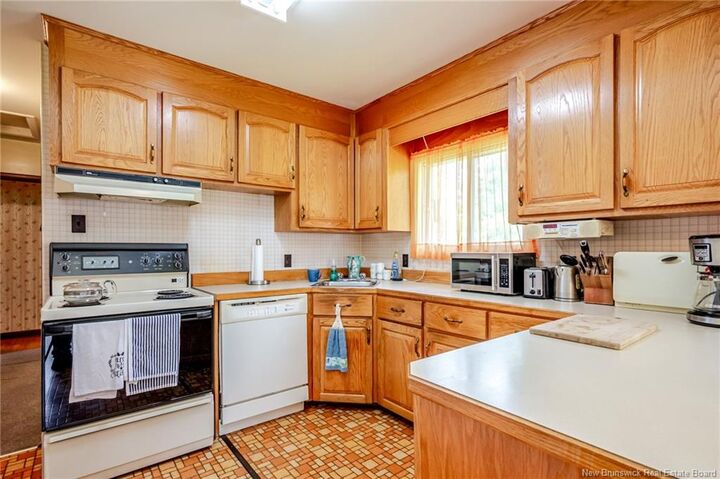 Property Photo:  51 Mountain Road  NB E2J 2W9 