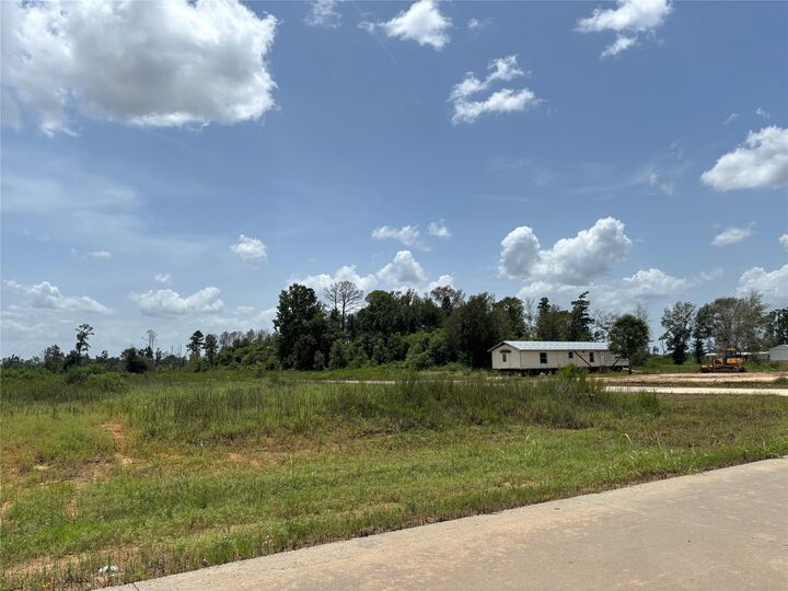 Property Photo:  121 Road 5888  TX 77327 