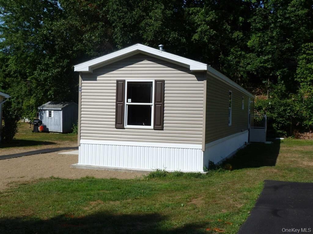 Property Photo: 11 Square Hill Road #27 NY 12553
