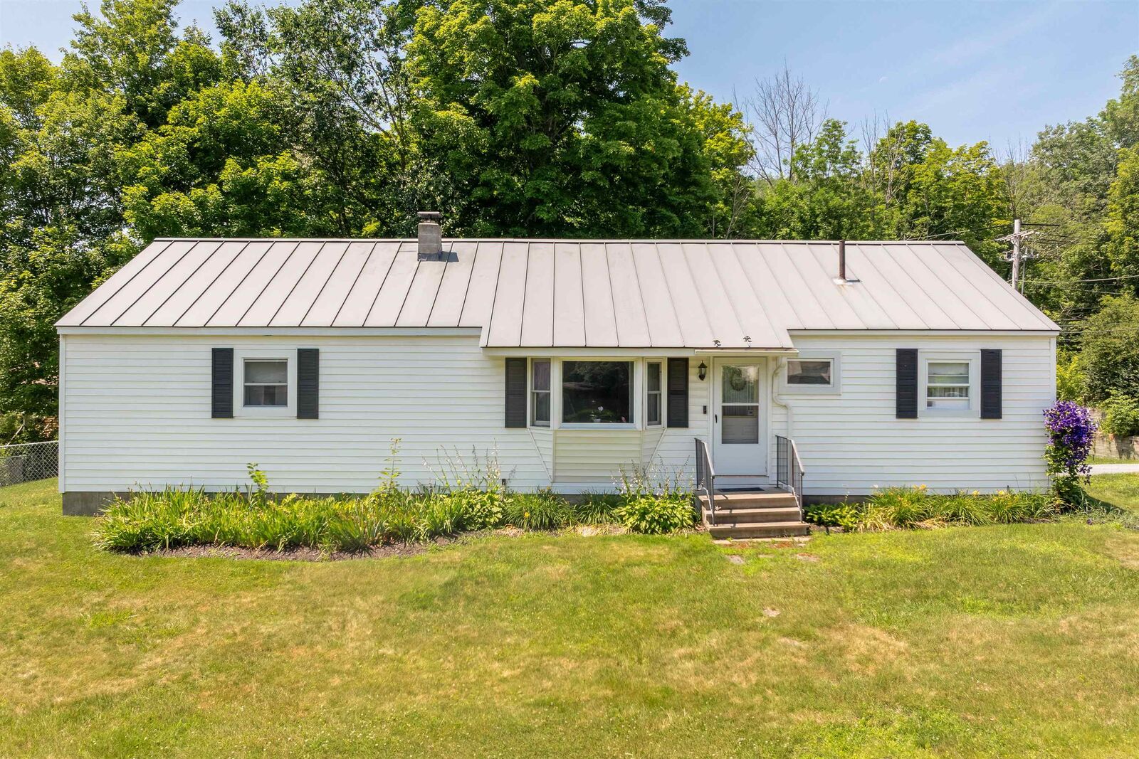 Property Photo:  9 Placid Square  NH 03766 