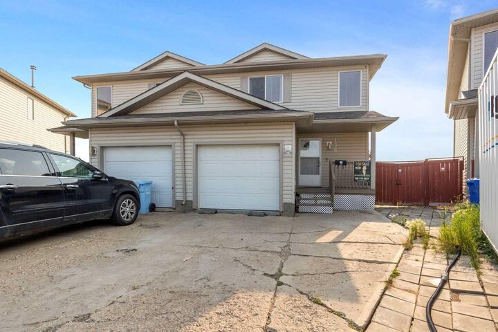 Property Photo: 136 Kodiak Crescent AB T9K 2L9