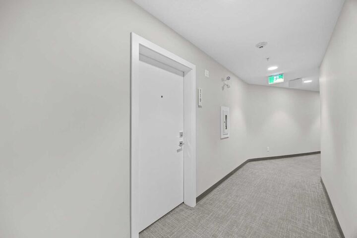 Property Photo: 383 Smith Street NW 119 AB T3B 6J9