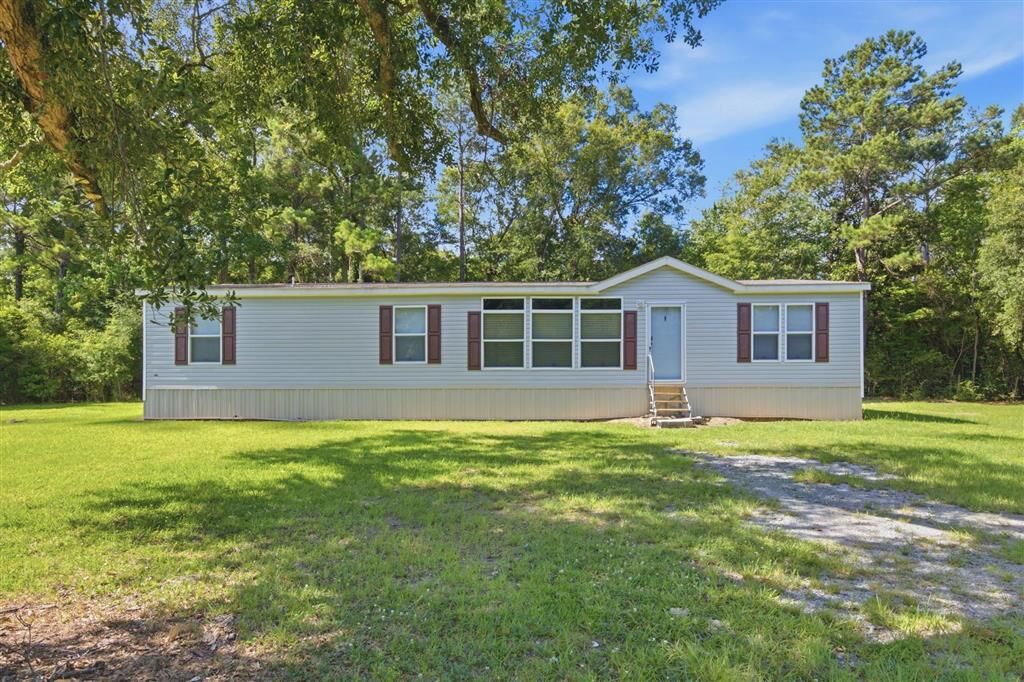 Property Photo:  213 Fielding Williams Road  LA 70660 