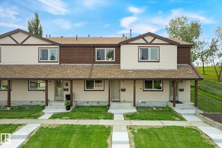 Property Photo:  13833 30 Street NW 2  AB T5Y 2B2 