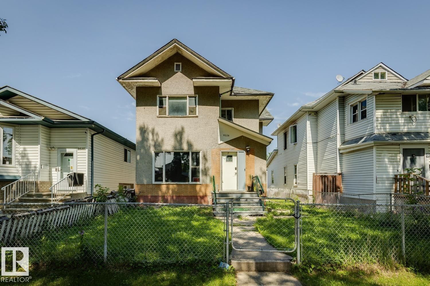 Property Photo:  9526 106A Avenue NW  AB T5H 0S8 