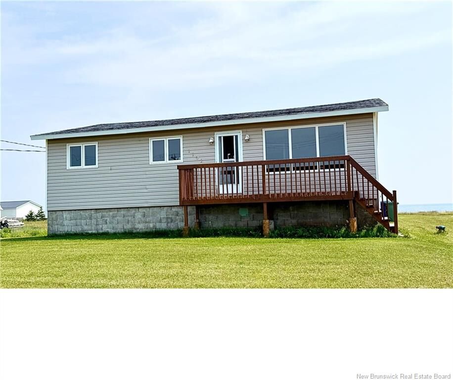 Property Photo:  1102 Boul. De La Mer  NB E8T 1V6 