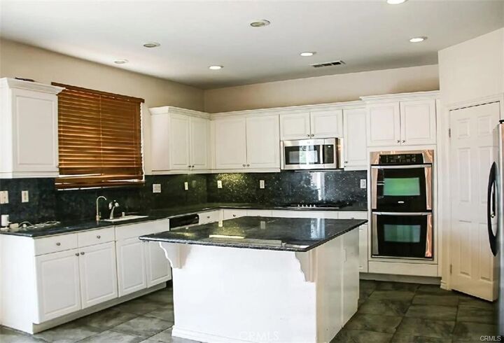 Property Photo:  7408 Morning Hills  CA 92880 