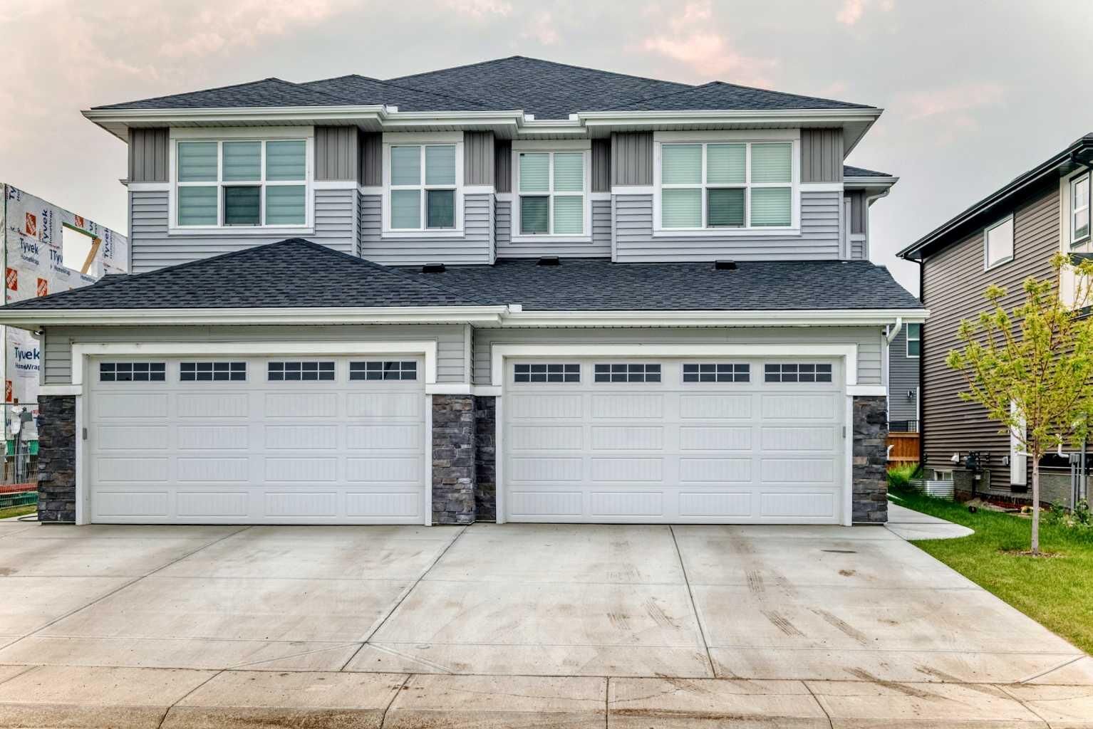 Property Photo:  427 Kinniburgh Loop  AB T1X 3C4 