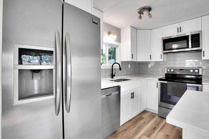 Property Photo: 64 Huntwell Way NE AB T2K 5T2