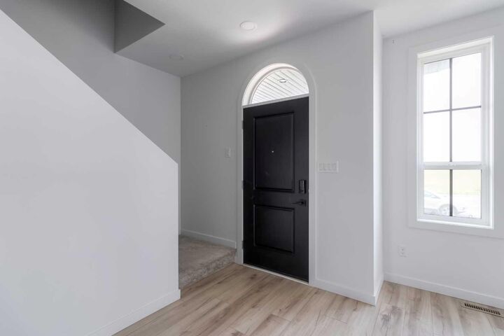 Property Photo:  633 Blackwolf Boulevard N  AB T1H 7H7 