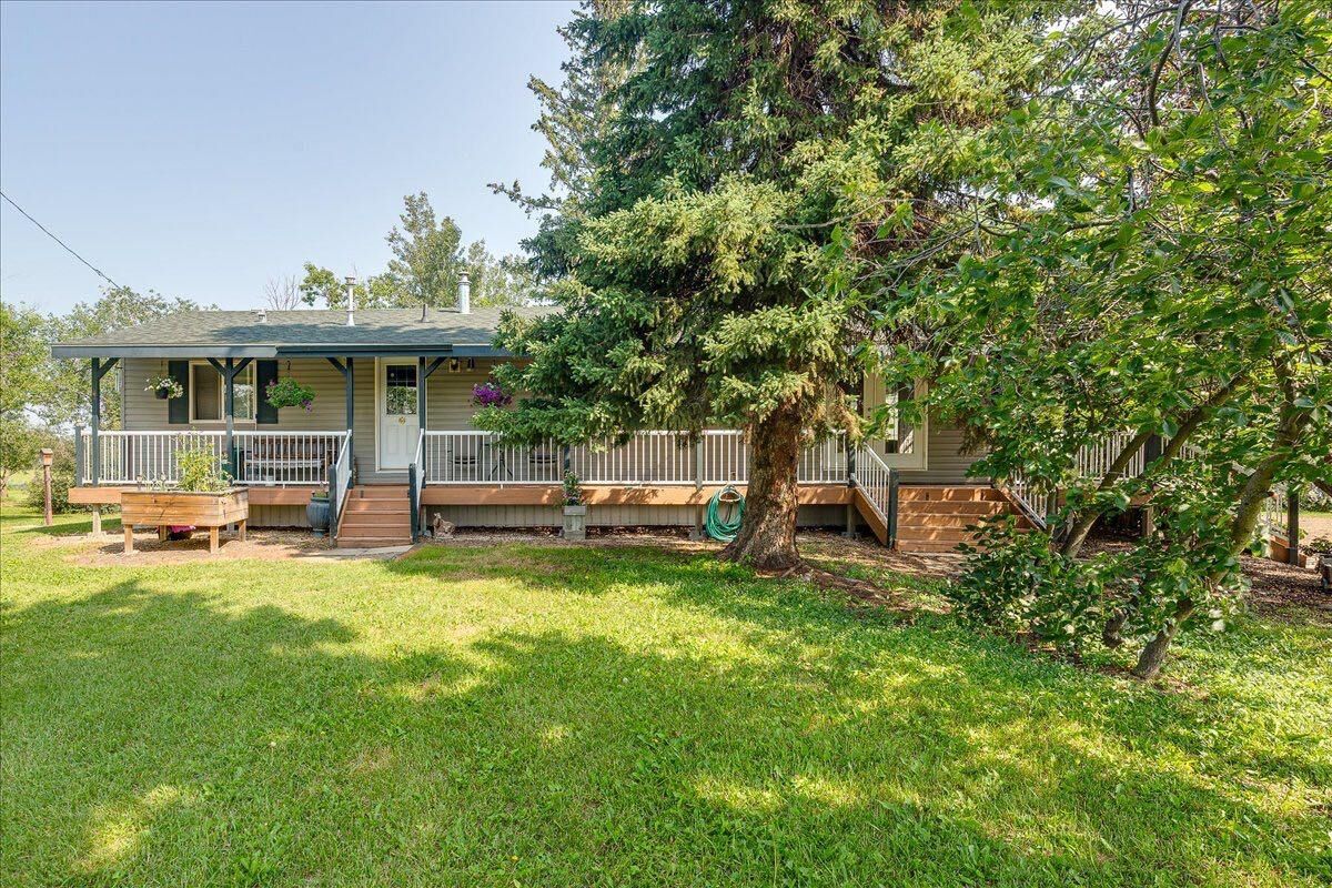 Property Photo: 430030 Range Road 242A AB T4J 1R1