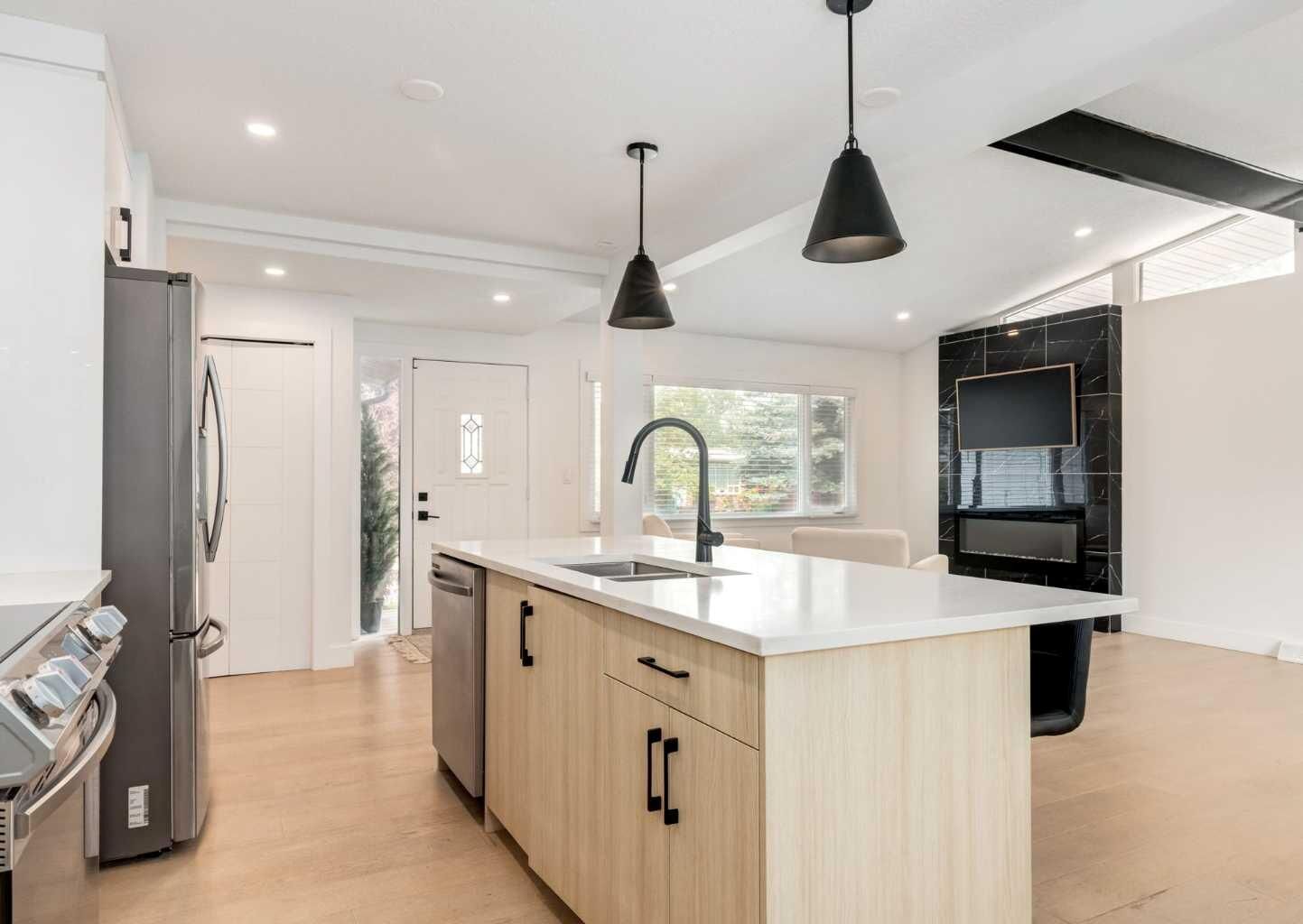 Property Photo:  1323 106 Avenue SW  AB T2W 0B8 