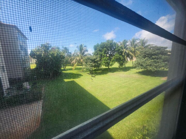 Property Photo:  230 NE 26th Avenue 209  FL 33435 