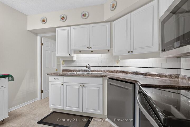 Property Photo:  1818 Cherryhill Road 203  ON K9K 1S6 