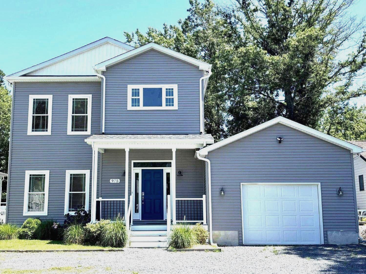 Property Photo:  975 Hawksbill Street  DE 19930 