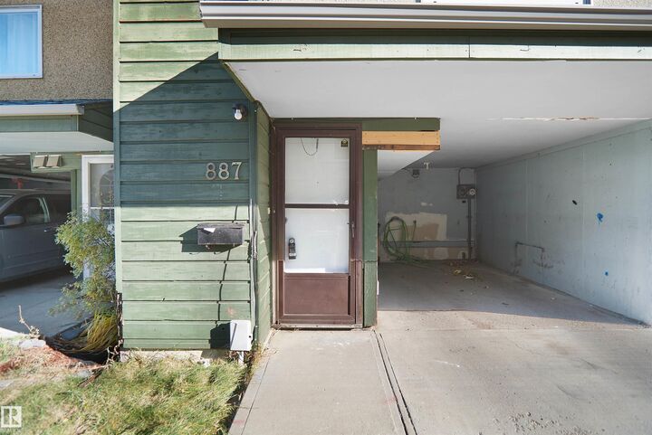 Property Photo:  887 Abbottsfield Road NW  AB T5W 4R4 