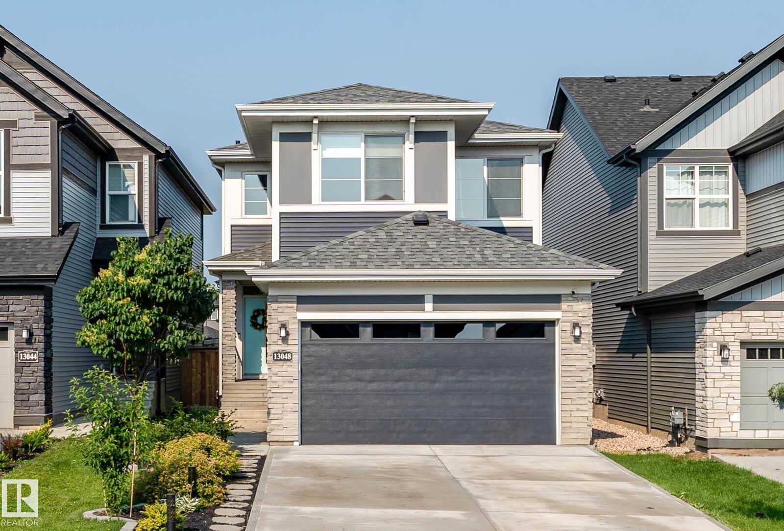 Property Photo:  13048 211 Street NW  AB T5S 0P5 