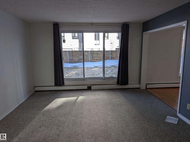 Property Photo: 7220 144 Avenue NW 109 AB T5C 3E4