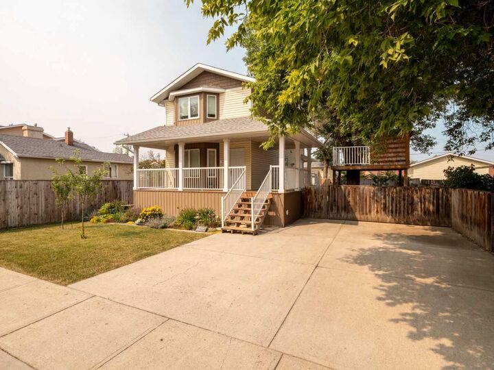 Property Photo: 132 14 Street N AB T1H 2V7