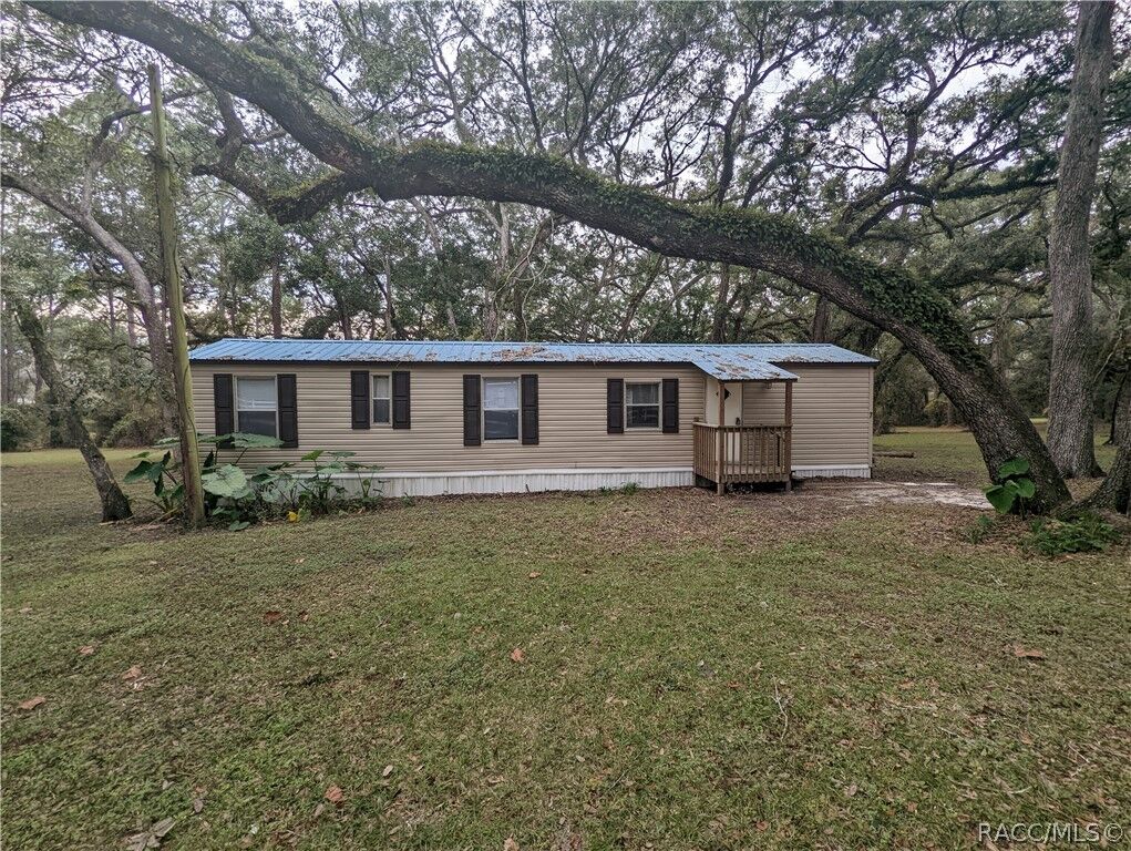 Property Photo:  7090 N Palmer Way  FL 34442 