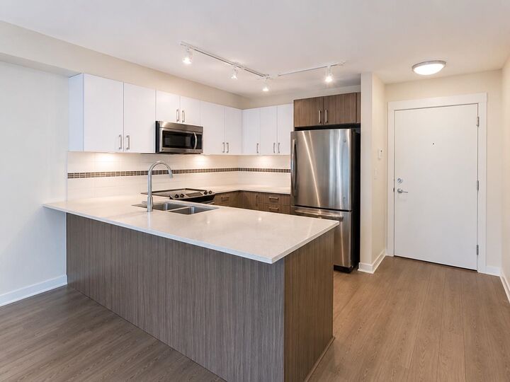 Property Photo: 8733 160 Street 308 BC V4N 6P9