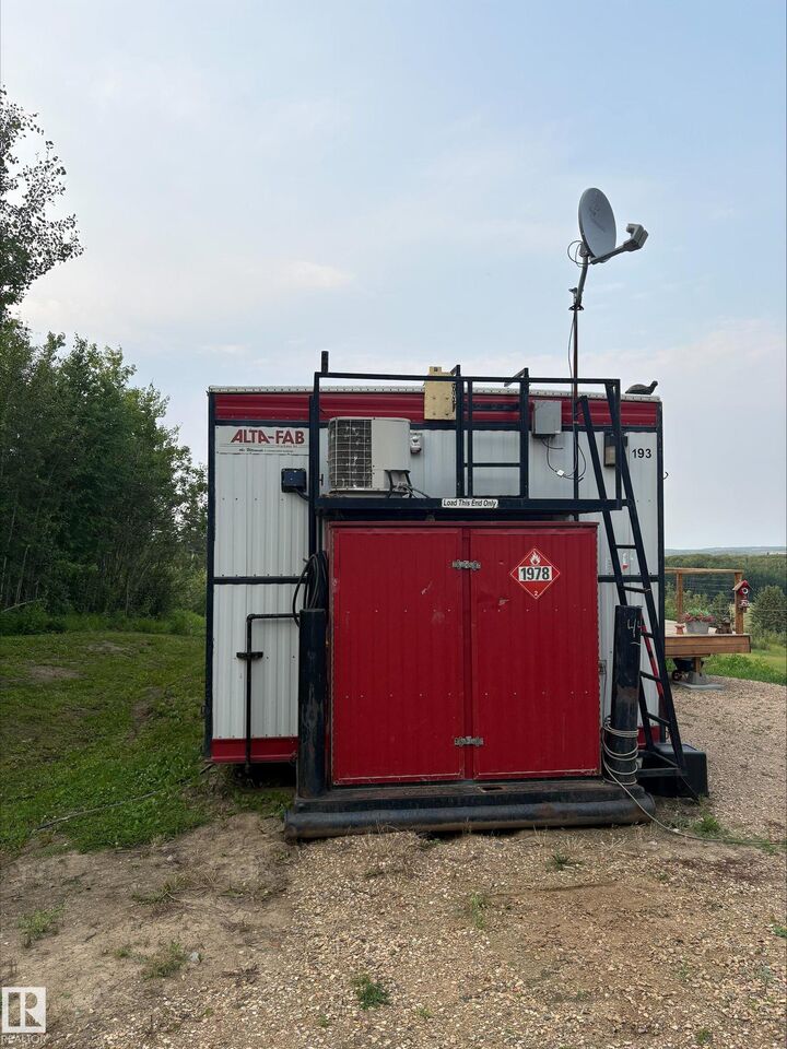 Property Photo: 243071 Twp Rd 664 AB T9S 1R8