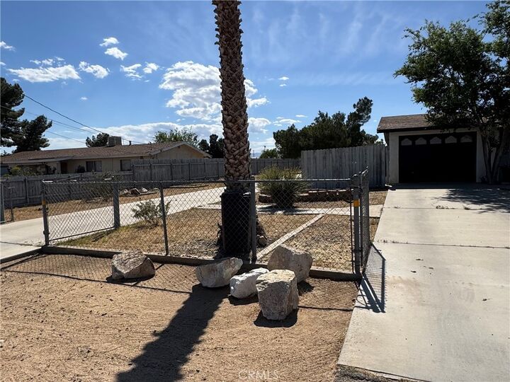 Property Photo:  11968 Bornite Ave  CA 92345 