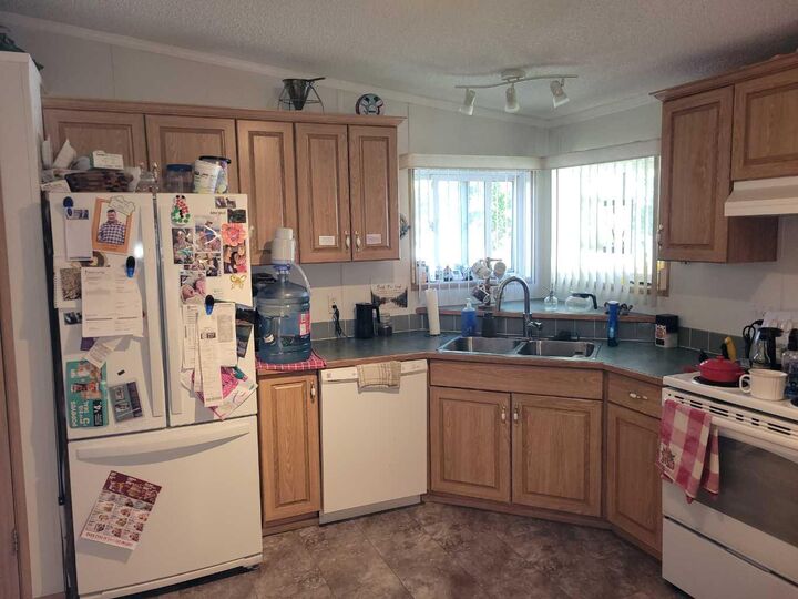 Property Photo:  1600 Strachan  SE 116  AB T1B 4M3 