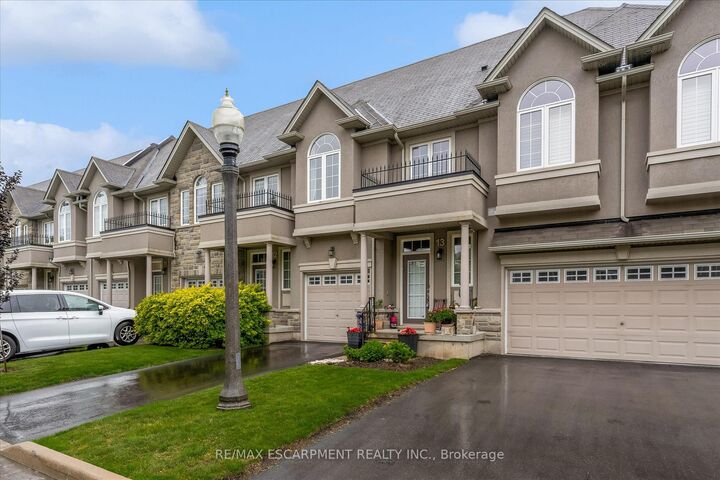 Property Photo: 370 Stonehenge Drive 13 ON L9K 0H9