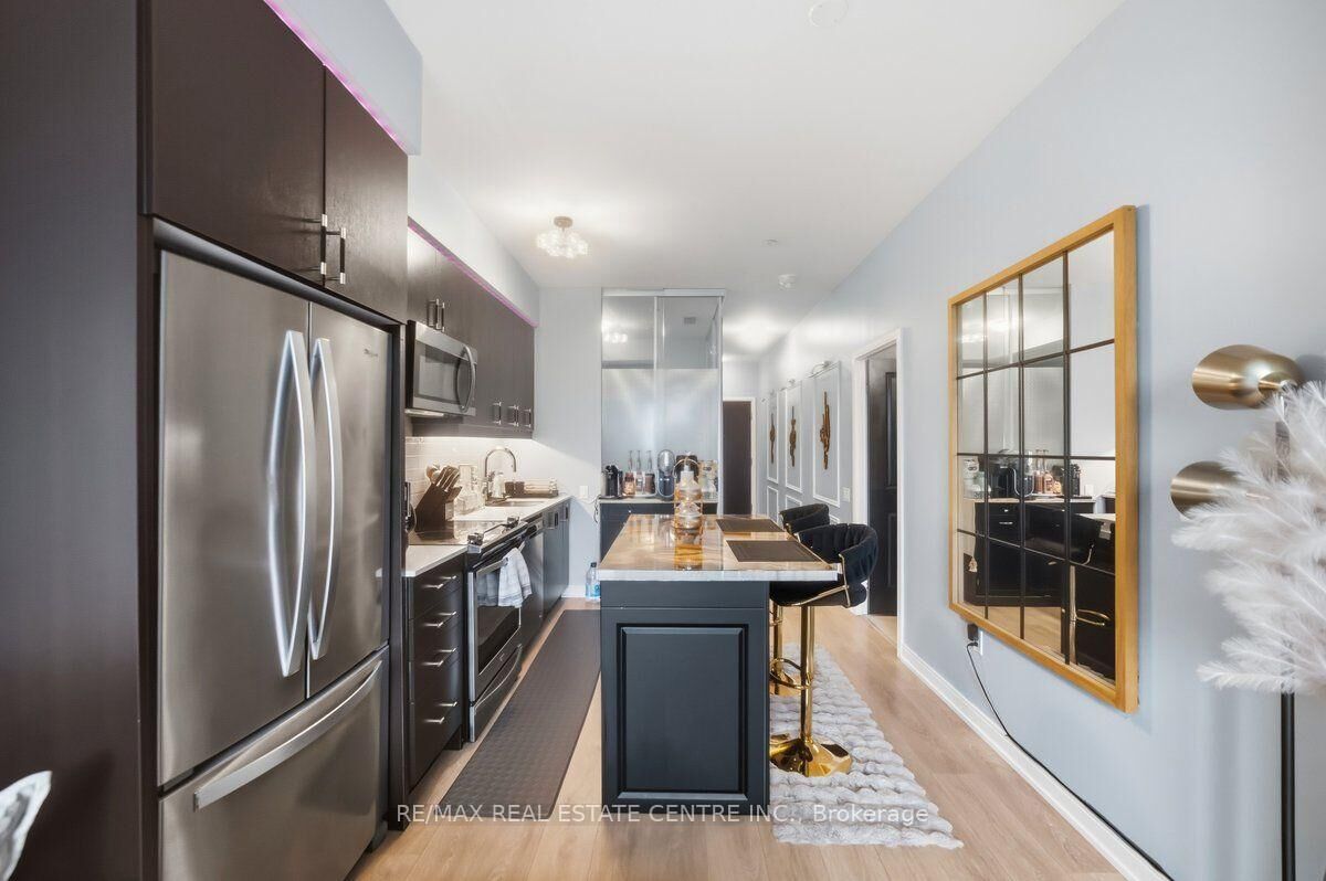 Property Photo:  8 Nahani Way 304 Way  ON L4Z 4J8 