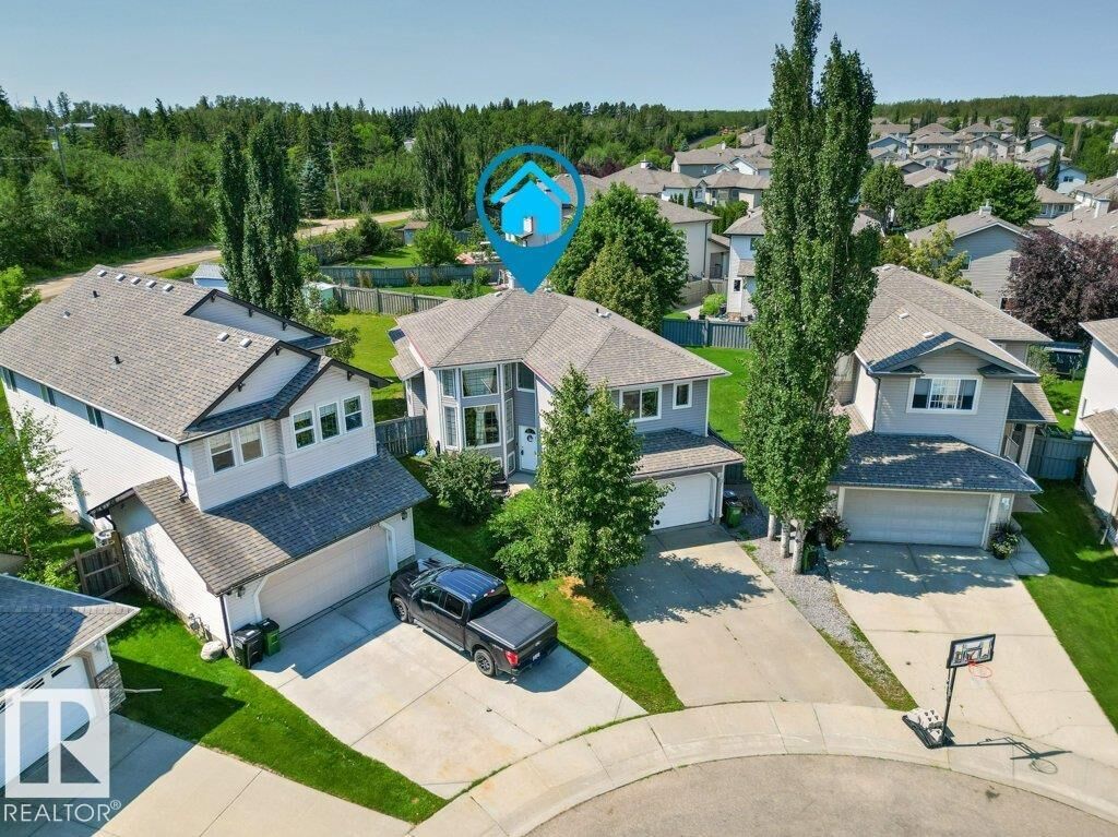 Property Photo: 4512 210 Street NW AB T6M 0G5