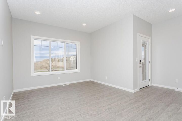 Property Photo: 306 Hawthorn Way AB T9E 0K1