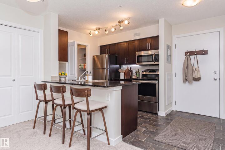 Property Photo:  5816 Mullen Place NW 322  AB T6R 0W3 