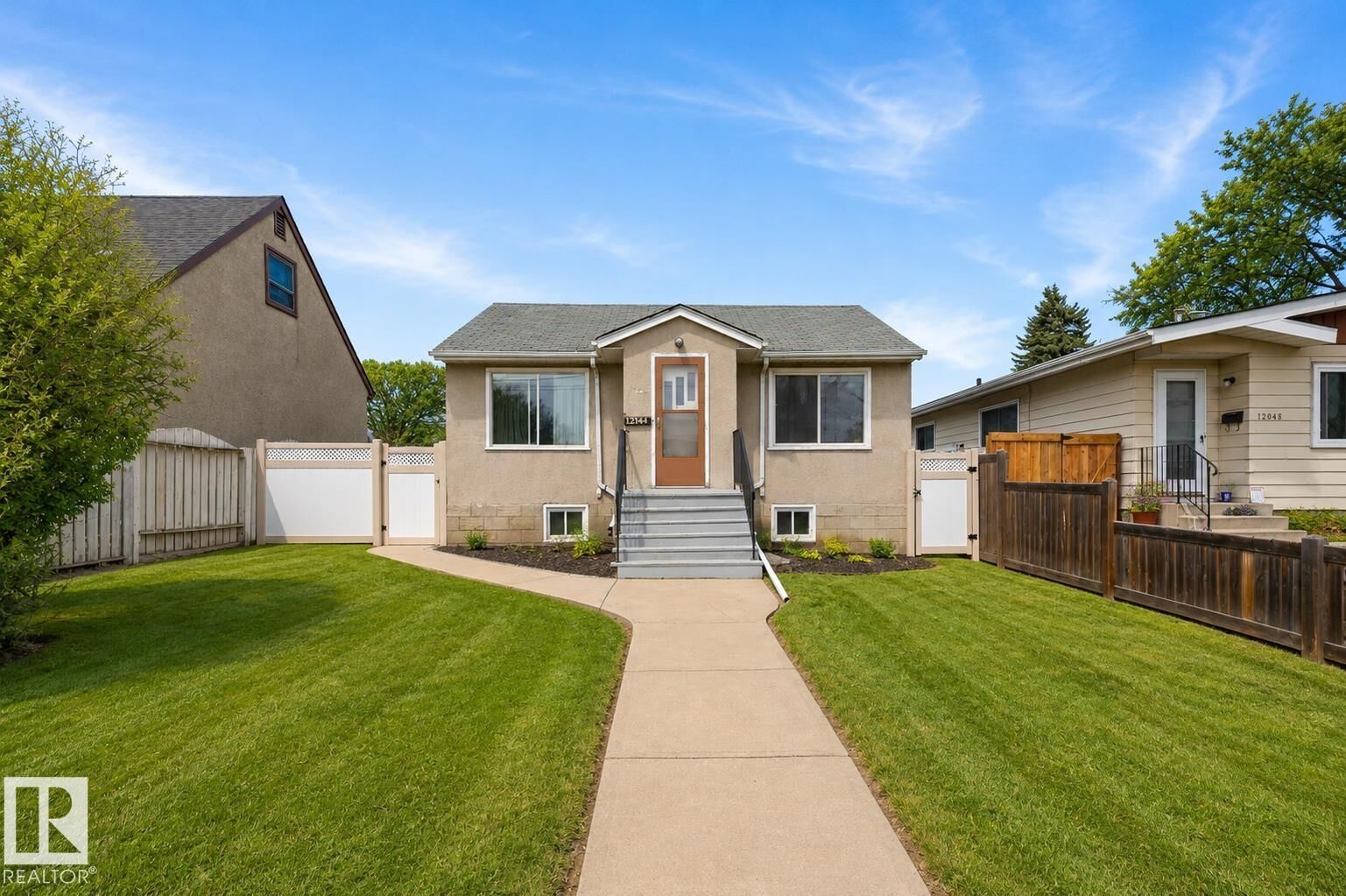 Property Photo:  12044 50 Street NW  AB T5W 3C4 