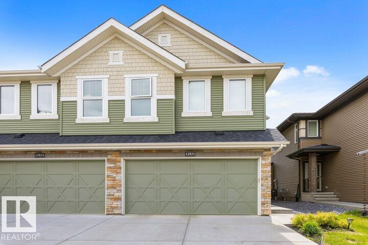 Property Photo:  12831 205 Street NW  AB T5S 0L7 