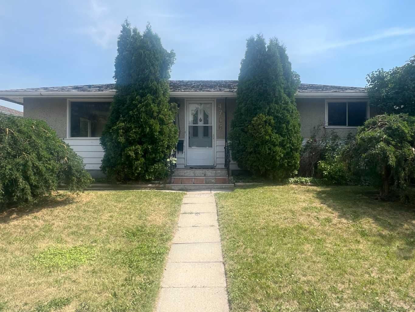 Property Photo: 4708 Greenview Drive NE AB T2E 5R6