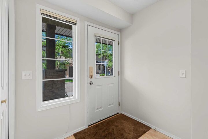 Property Photo: 34 Eversyde Common SW AB T2Y 4Z7