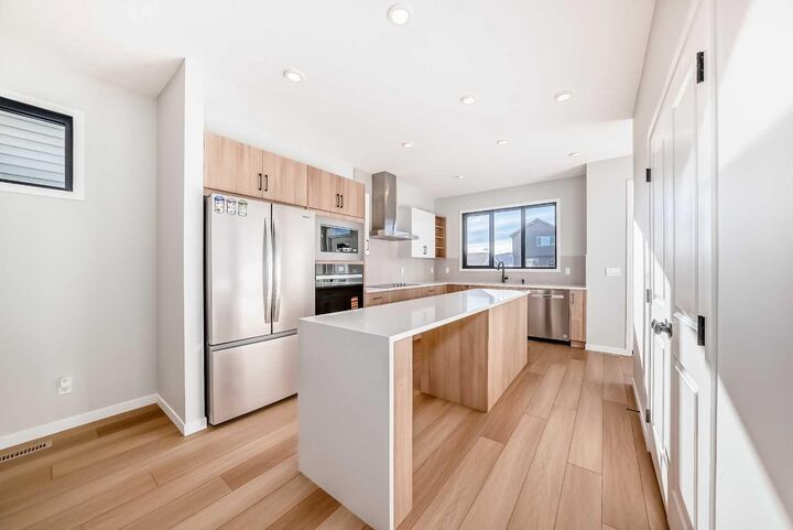 Property Photo: 1245 Creekview Drive SW AB T2X 5Y7