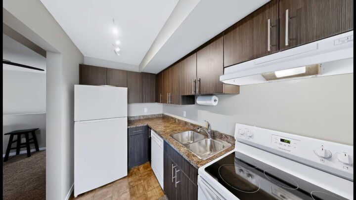 Property Photo: 201 Abasand Drive 524 AB T9J 2L4