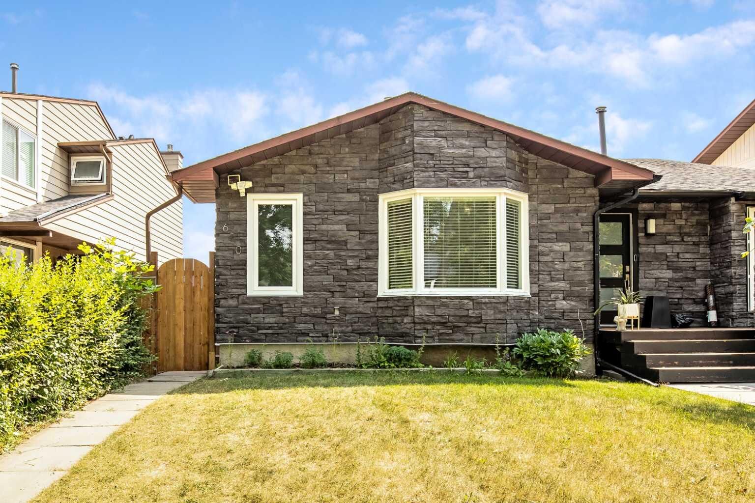 Property Photo: 610 Strathcona Drive SW AB T3H 1K4