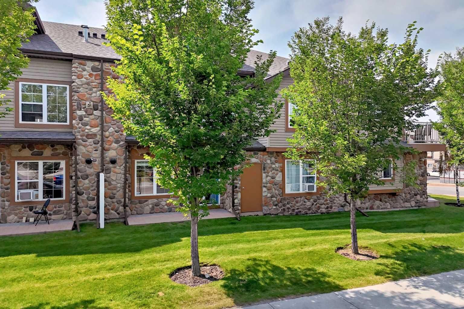 Property Photo: 160 Panatella Landing NW 103 AB T3K 4Y3