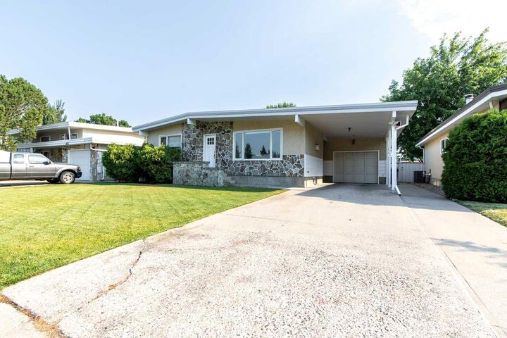 Property Photo: 3621 Redwood Road S AB T1K 3R1