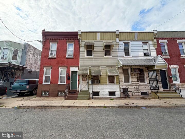 Property Photo:  3412 Braddock Street  PA 19134 