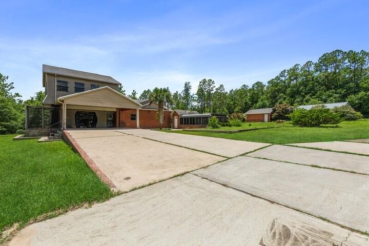 Property Photo:  6051 Tupelo Street  FL 32539 