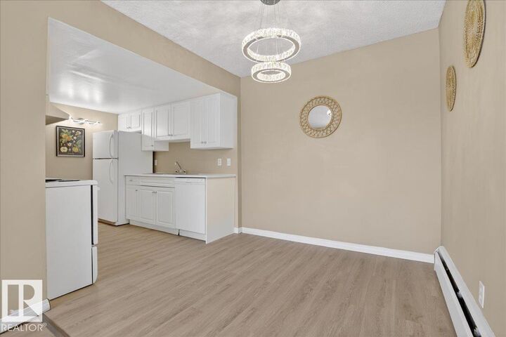 Property Photo: 2908 116A Avenue NW 309 AB T5W 4R7
